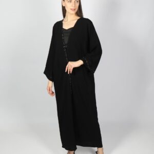 Woman wearing a black nida abaya