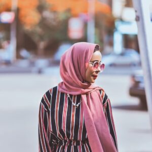 Woman wearing a patterned modal silk hijab - Modal Silk Hijab signature print