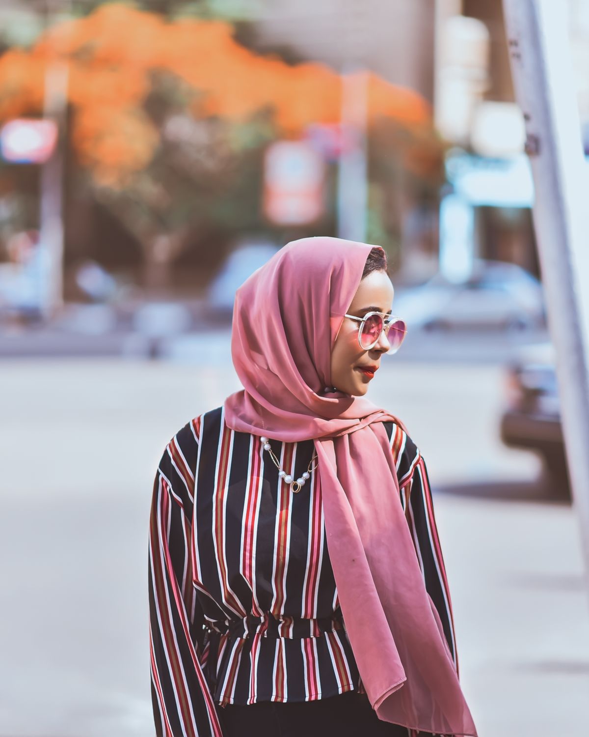 Woman wearing a patterned modal silk hijab - Modal Silk Hijab signature print